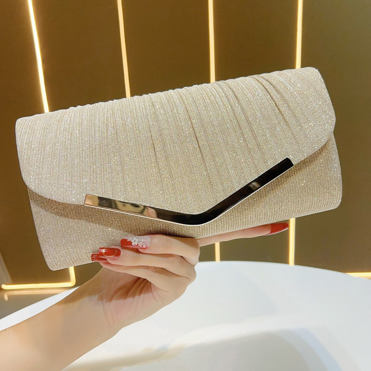 Elegant Champagne Pleated Clutch – Perfect Match for Our Navy Two-Piece Set